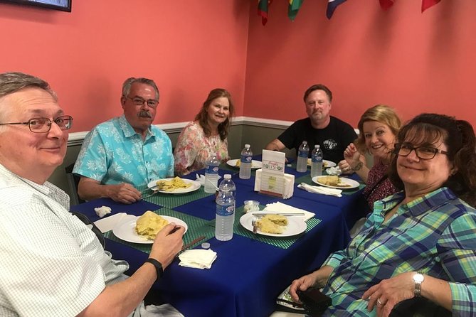 Cayman's Classic Food Tasting & Cultural Experience - Nikki and Reuben shape the day