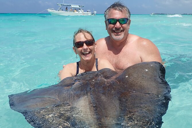 (Family owned) Stingray city sandbar, Starfish Beach & Snorkeling - From George Town pickup to the marina
