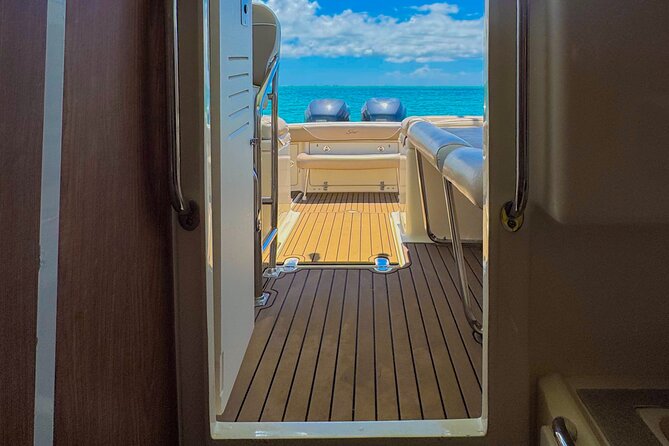 Grand Cayman Private Custom Boating Adventure - Rum Point offers a beach break with conditions attached