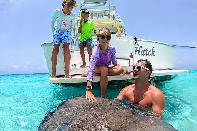 Private Charter 34ft Express Cruiser Stingay City Reef Snorkeling - Stingray City: the main event in waist-deep water