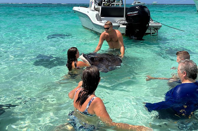 Private Charter for Stingray city - Snorkeling over coral and among Grand Cayman fish